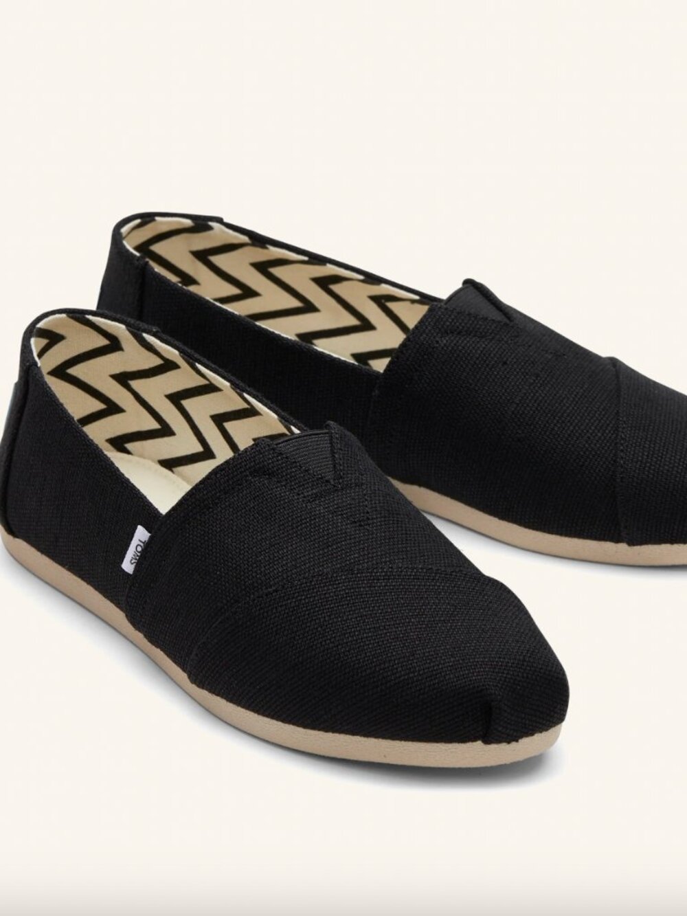 Toms Classic Slip-On Canvas Shoes in Black with Tan Sole